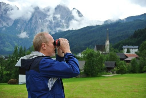 Man using the 8×42,10×42 Sport ED Binoculars