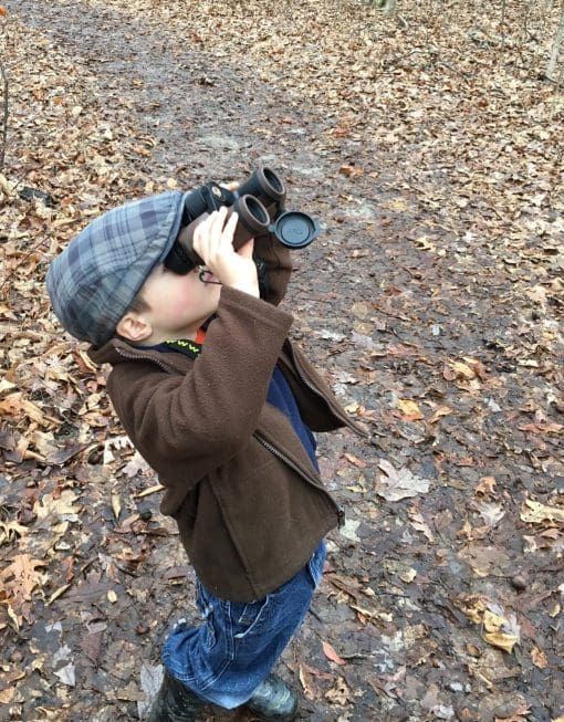 Boy using the 6.5×32 Explore Binoculars
